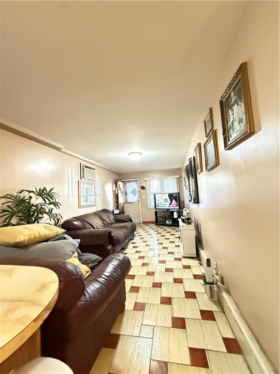 52 Bay 22nd Street Brooklyn, NY 11214 - Photo 5 of 20 a living room with furniture and a rug