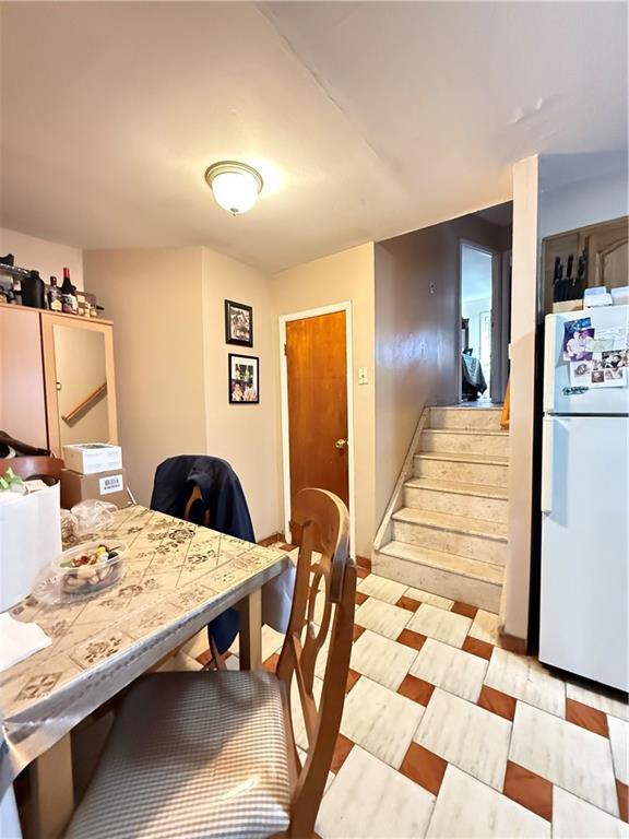 52 Bay 22nd Street Brooklyn, NY 11214 - Photo 6 of 20 a bedroom with a bed and a table in it