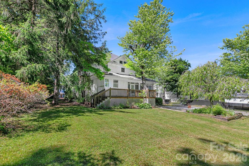 208 West Probart Street Brevard, NC 28712 - Photo 45 of 48 a view of a house with a yard