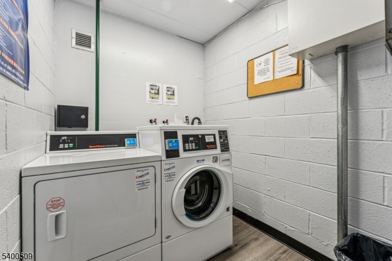 170 Lafayette Avenue, Unit 11E Passaic, NJ 07055 - Photo 21 of 32 a utility room with dryer and washer