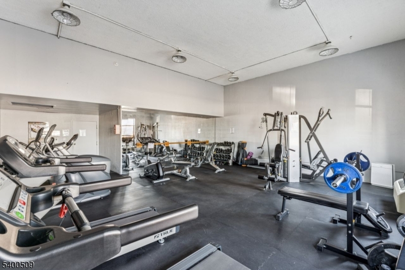 170 Lafayette Avenue, Unit 11E Passaic, NJ 07055 - Photo 27 of 32 a view of a room with gym equipment