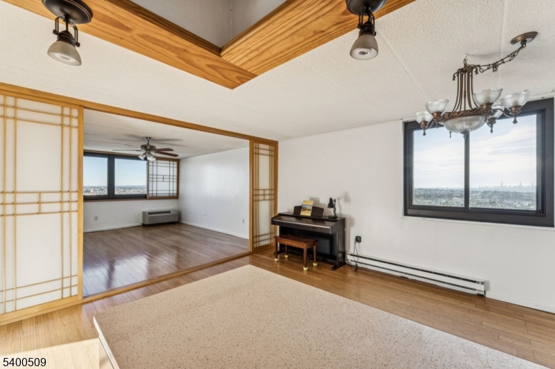 170 Lafayette Avenue, Unit 11E Passaic, NJ 07055 - Photo 7 of 32 a living room with furniture