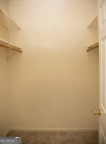 a bathroom with a tub and a shower