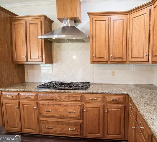 a room with window and a large window