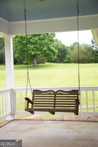 a view of a floor to ceiling window and an umbrella