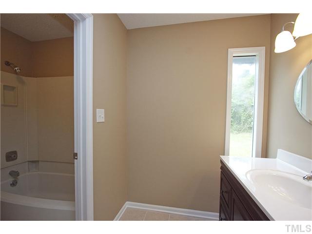 3913 Peppertree Place Raleigh, NC 27604 - Photo 7 of 13 Spotless ... new tile, new paint and fixtures!