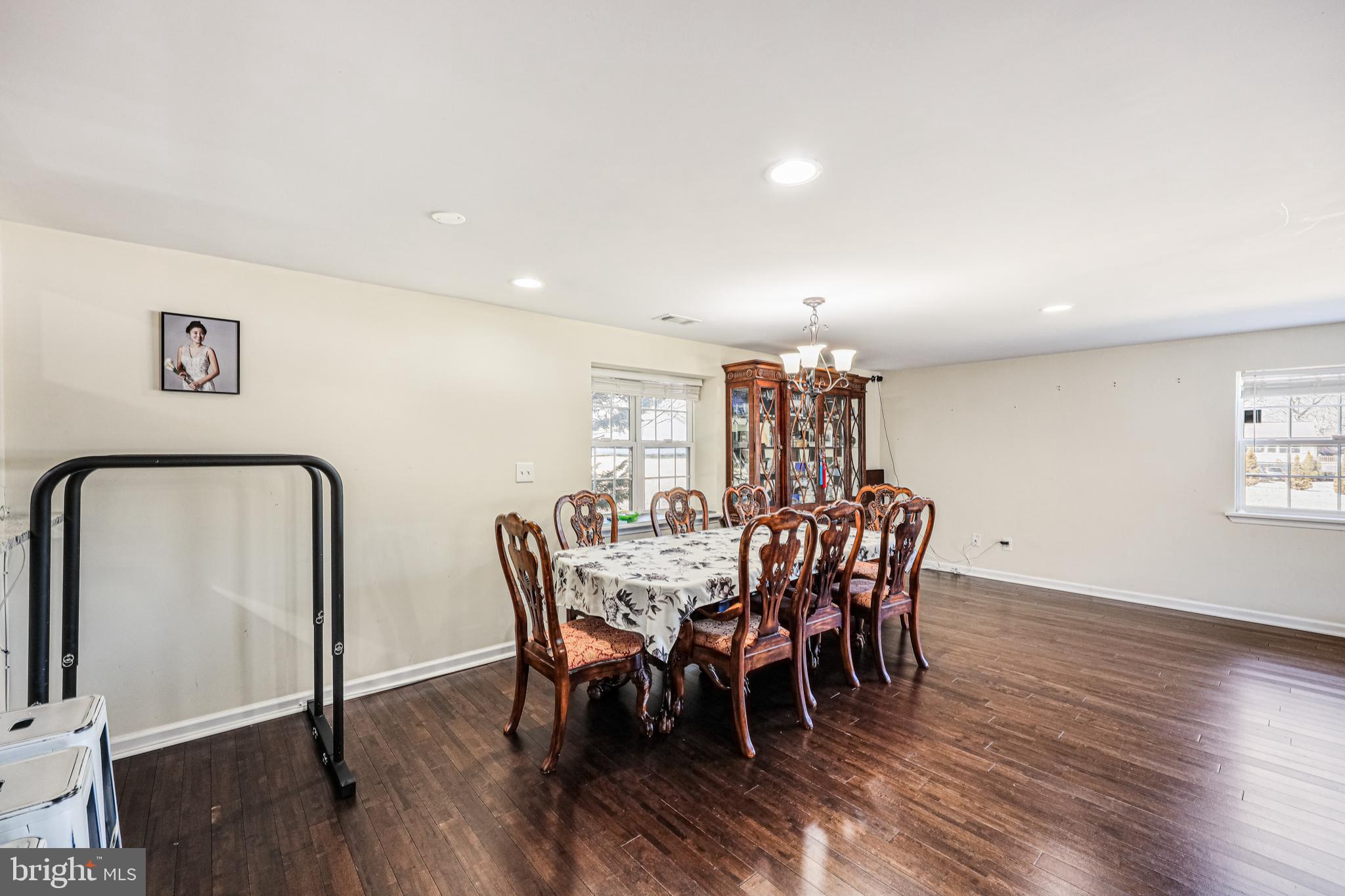 14816 Bushy Park Road Woodbine, MD 21797 - Photo 12 of 40 a view of a dining room with furniture and wooden floor