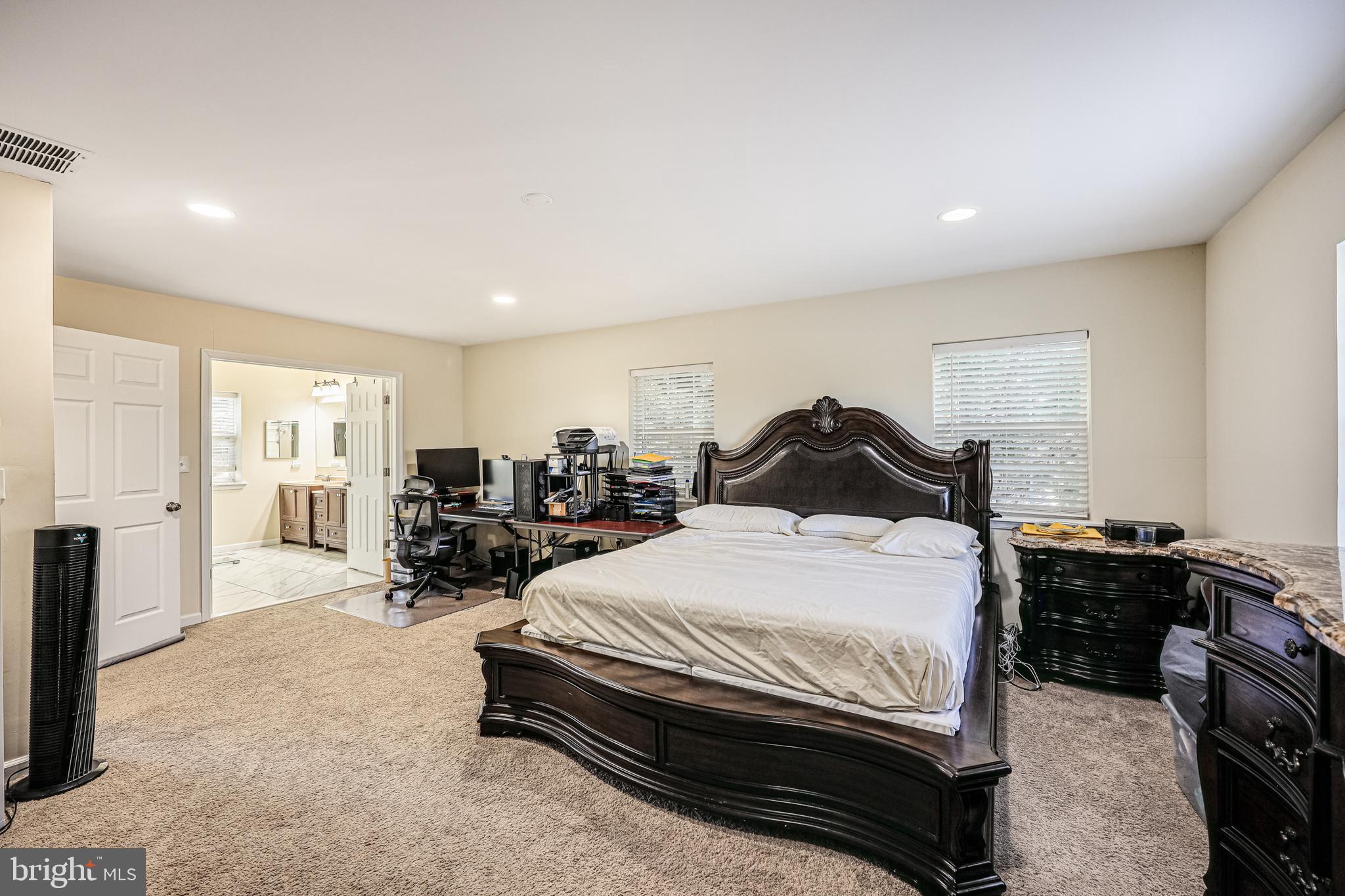 14816 Bushy Park Road Woodbine, MD 21797 - Photo 13 of 40 a bedroom with a bed and a large window