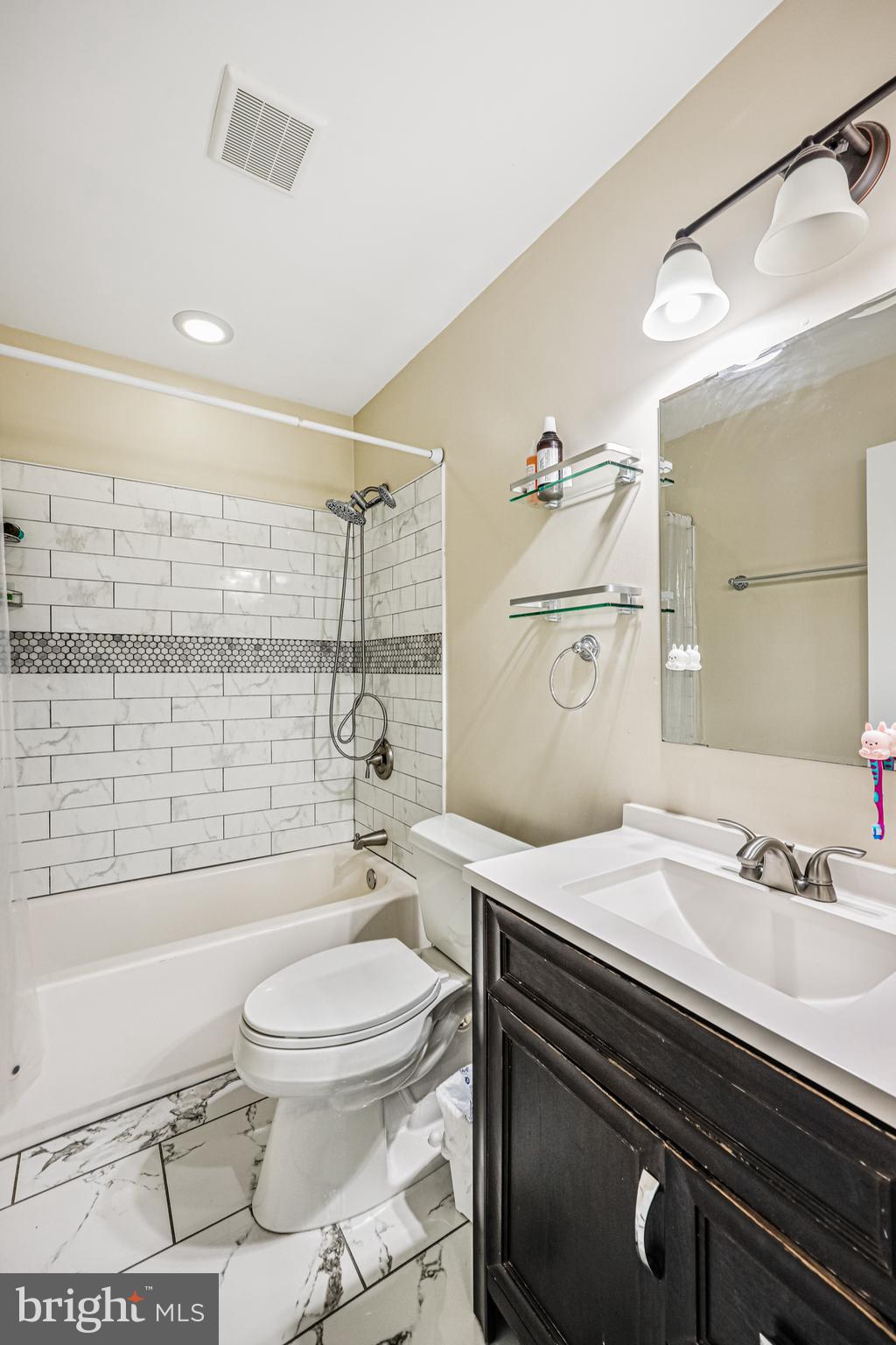 14816 Bushy Park Road Woodbine, MD 21797 - Photo 21 of 40 a bathroom with a sink a toilet and shower