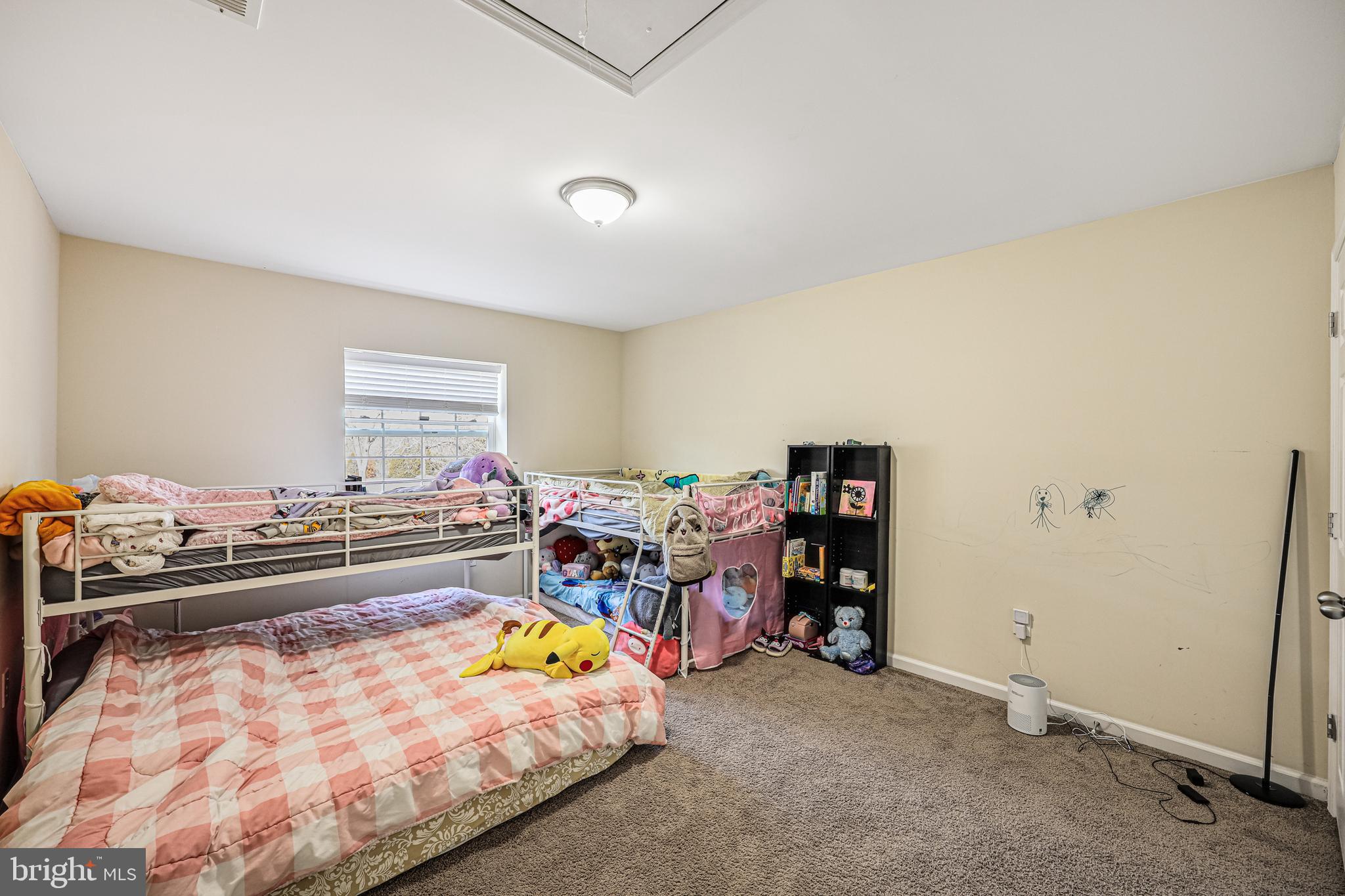14816 Bushy Park Road Woodbine, MD 21797 - Photo 22 of 40 a bed room with a bed and a book shelf