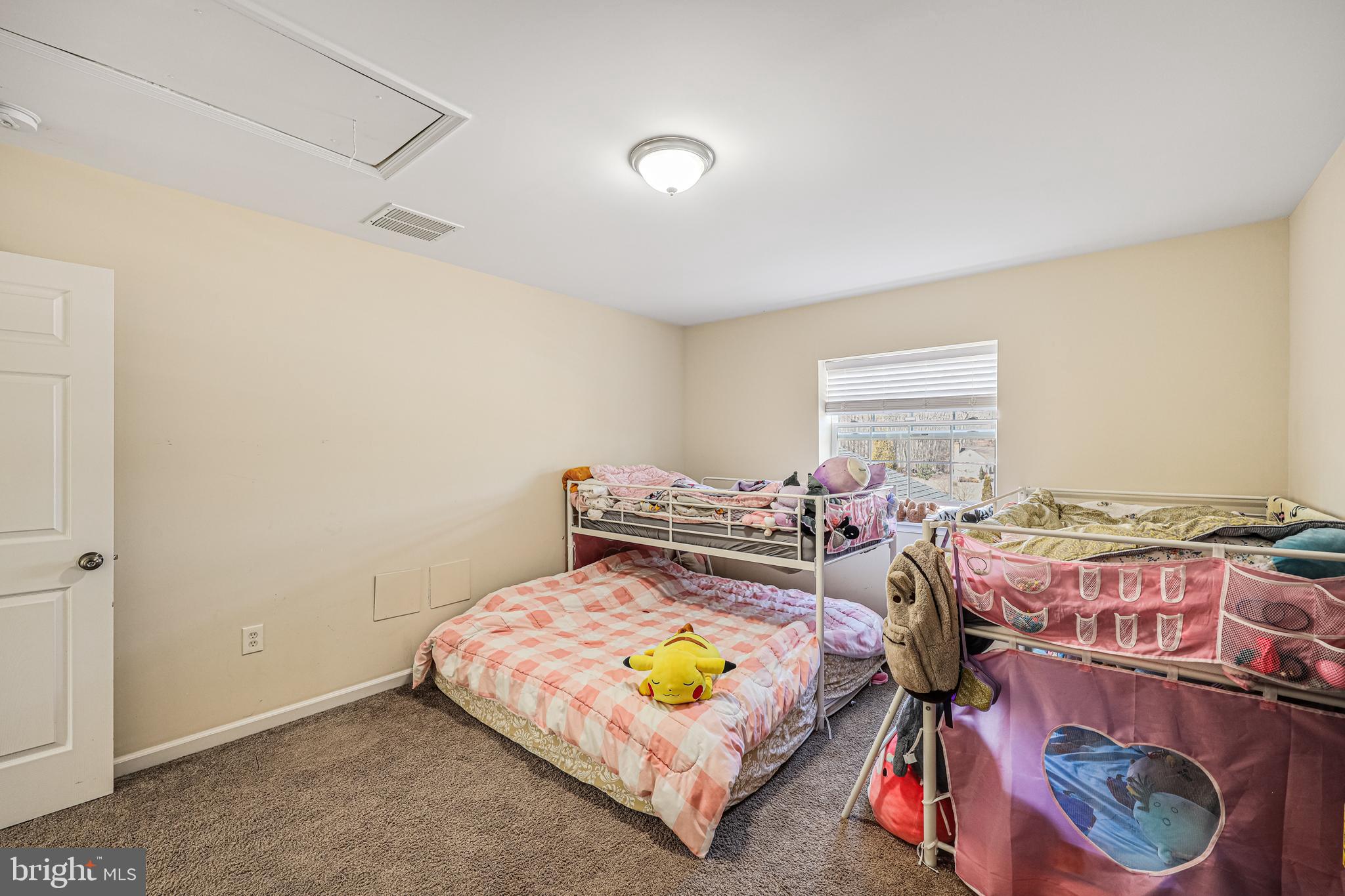 14816 Bushy Park Road Woodbine, MD 21797 - Photo 23 of 40 a bedroom with a bed and a window