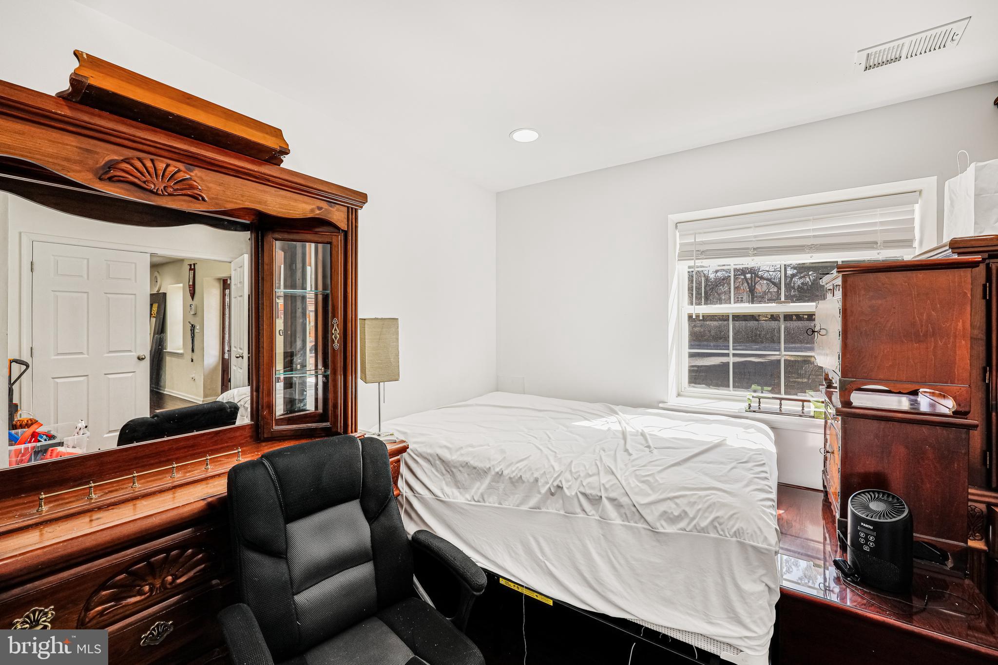 14816 Bushy Park Road Woodbine, MD 21797 - Photo 26 of 40 a bedroom with furniture and a window