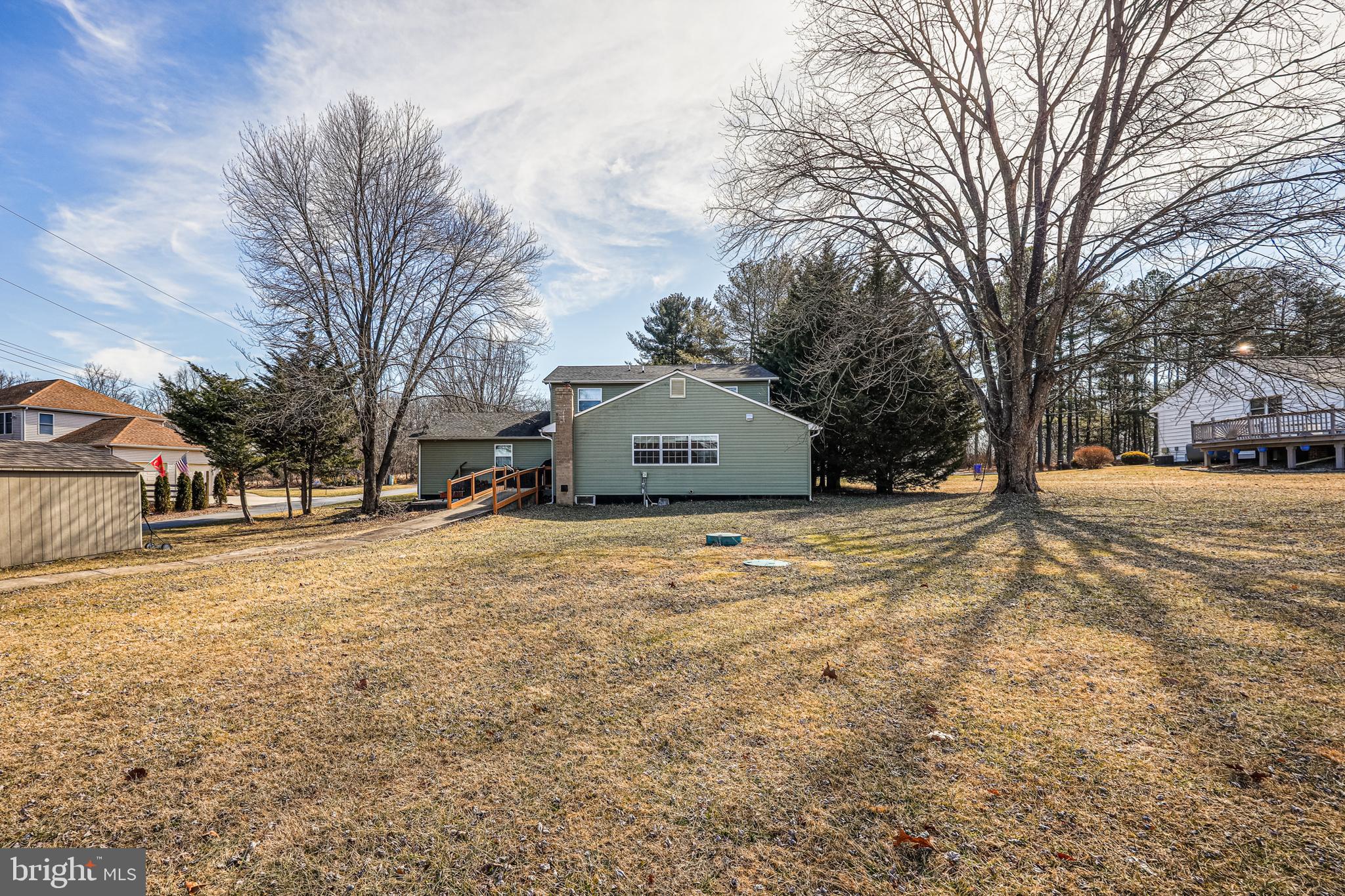 14816 Bushy Park Road Woodbine, MD 21797 - Photo 39 of 40 a house with trees in front of it