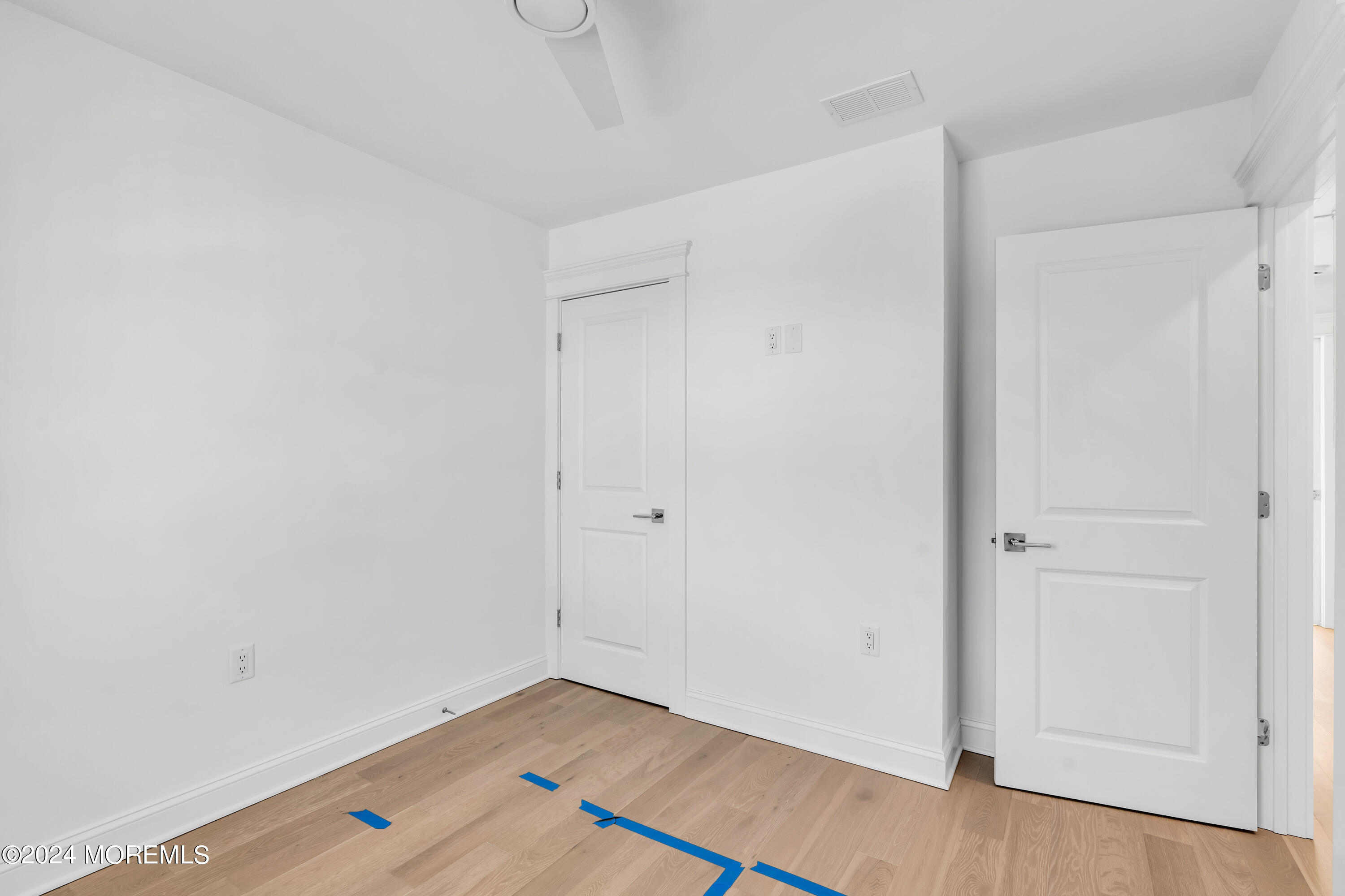 17 Shell Road, Unit 138 Mantoloking, NJ 08738 - Photo 25 of 45 a view of room with wooden floor