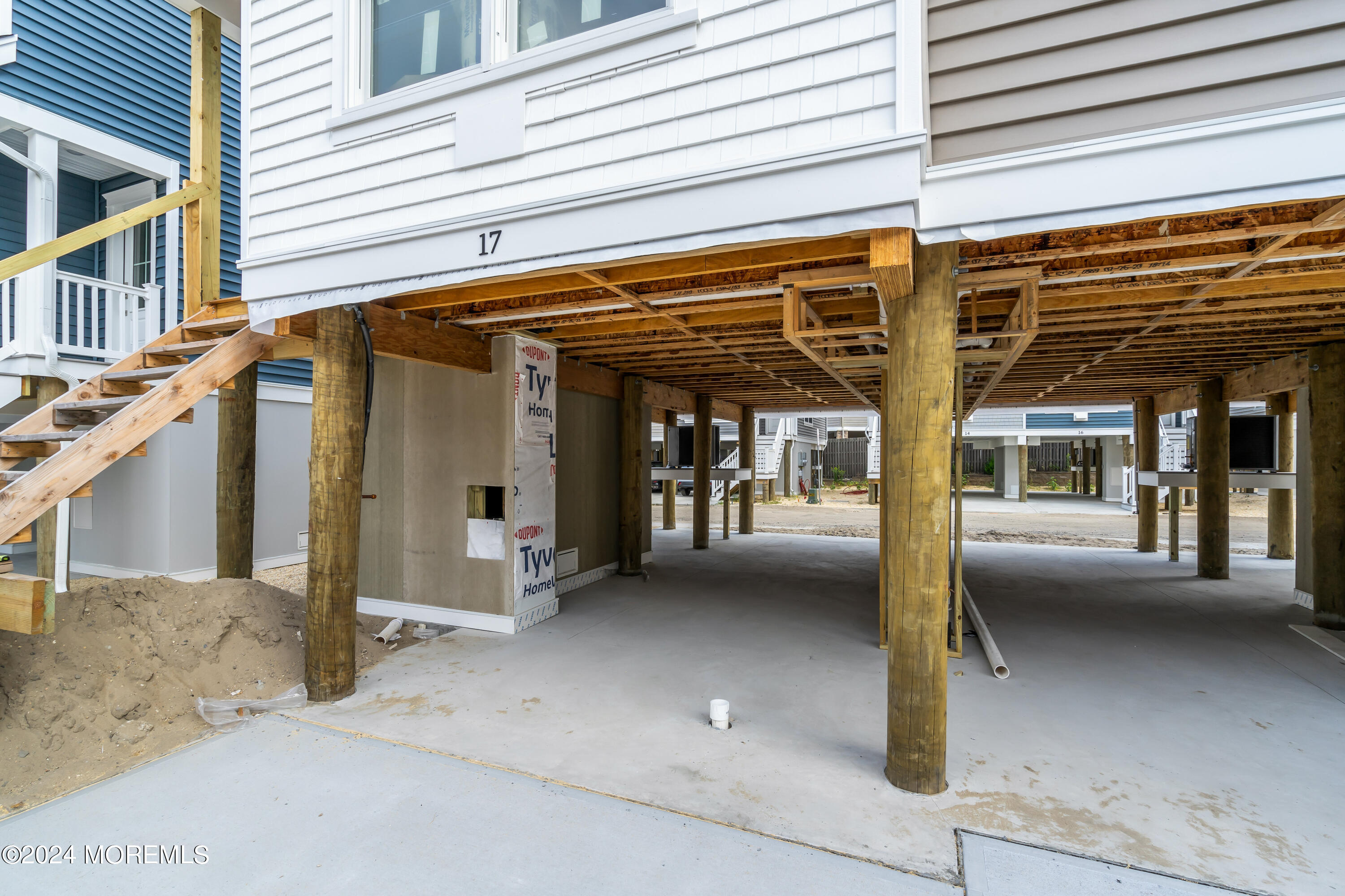 17 Shell Road, Unit 138 Mantoloking, NJ 08738 - Photo 39 of 45 a view of a porch with a table and chairs