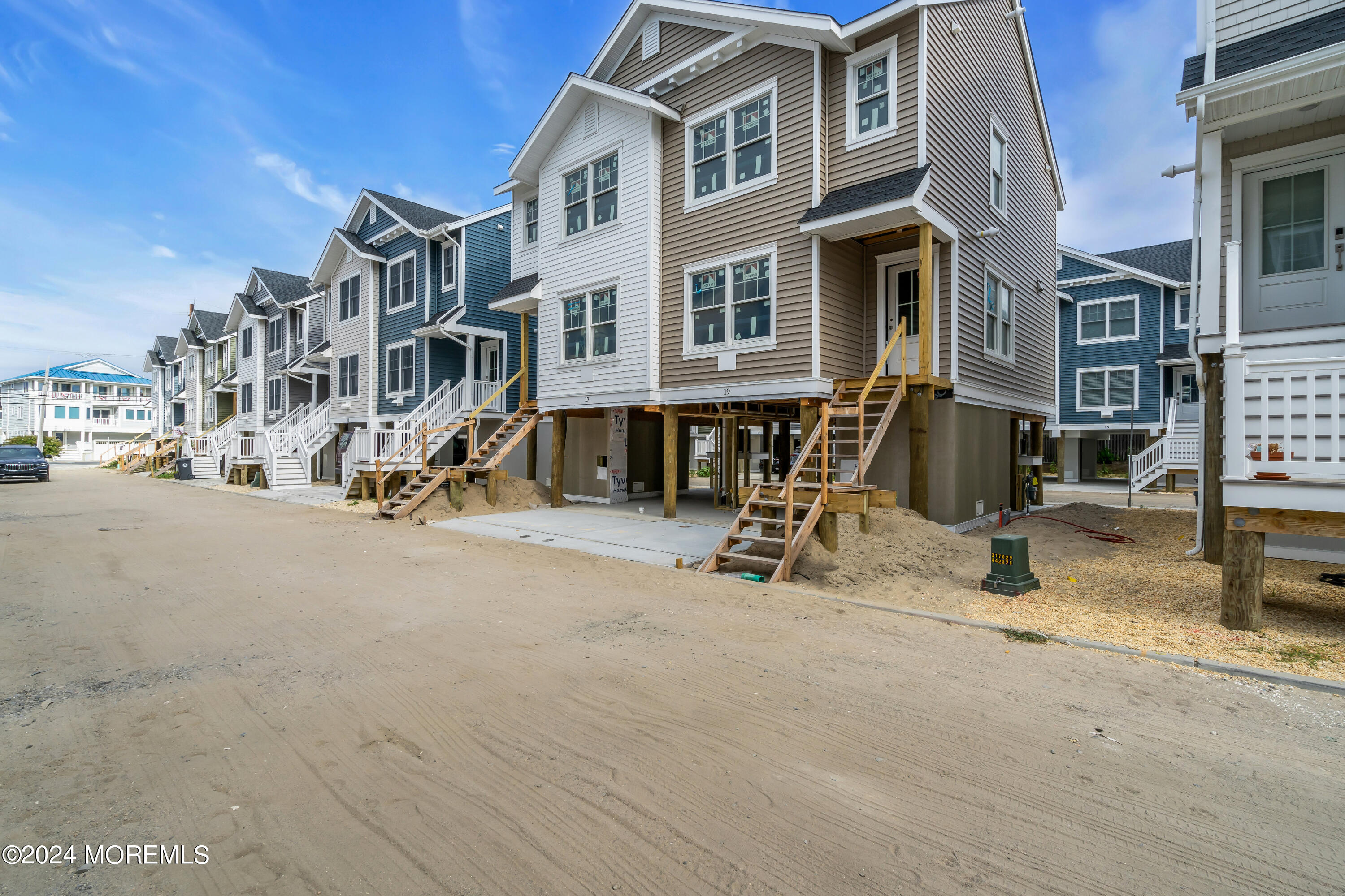 17 Shell Road, Unit 138 Mantoloking, NJ 08738 - Photo 4 of 45 a view of a street with tall buildings