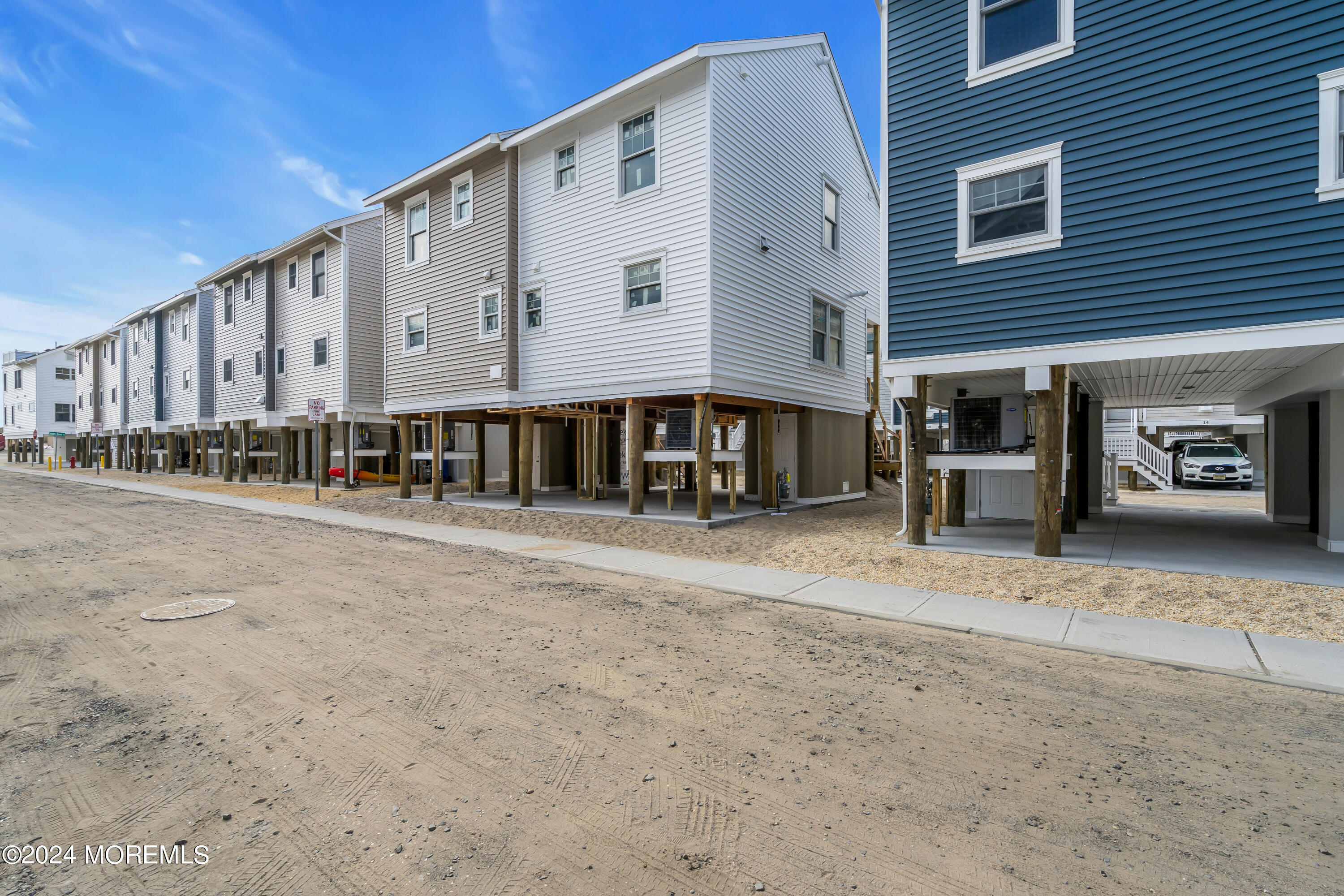 17 Shell Road, Unit 138 Mantoloking, NJ 08738 - Photo 42 of 45 a front view of a building with street