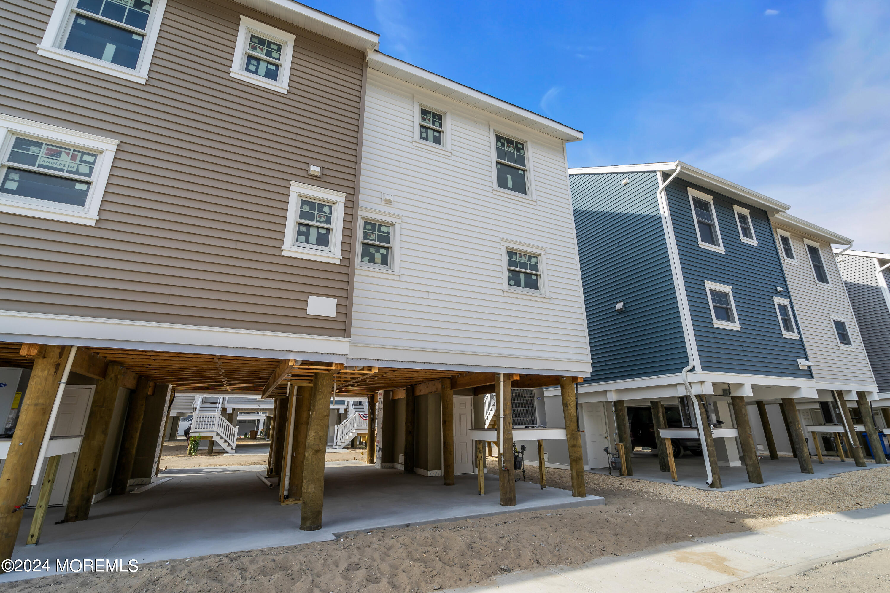 17 Shell Road, Unit 138 Mantoloking, NJ 08738 - Photo 45 of 45 a front view of a building with parking space