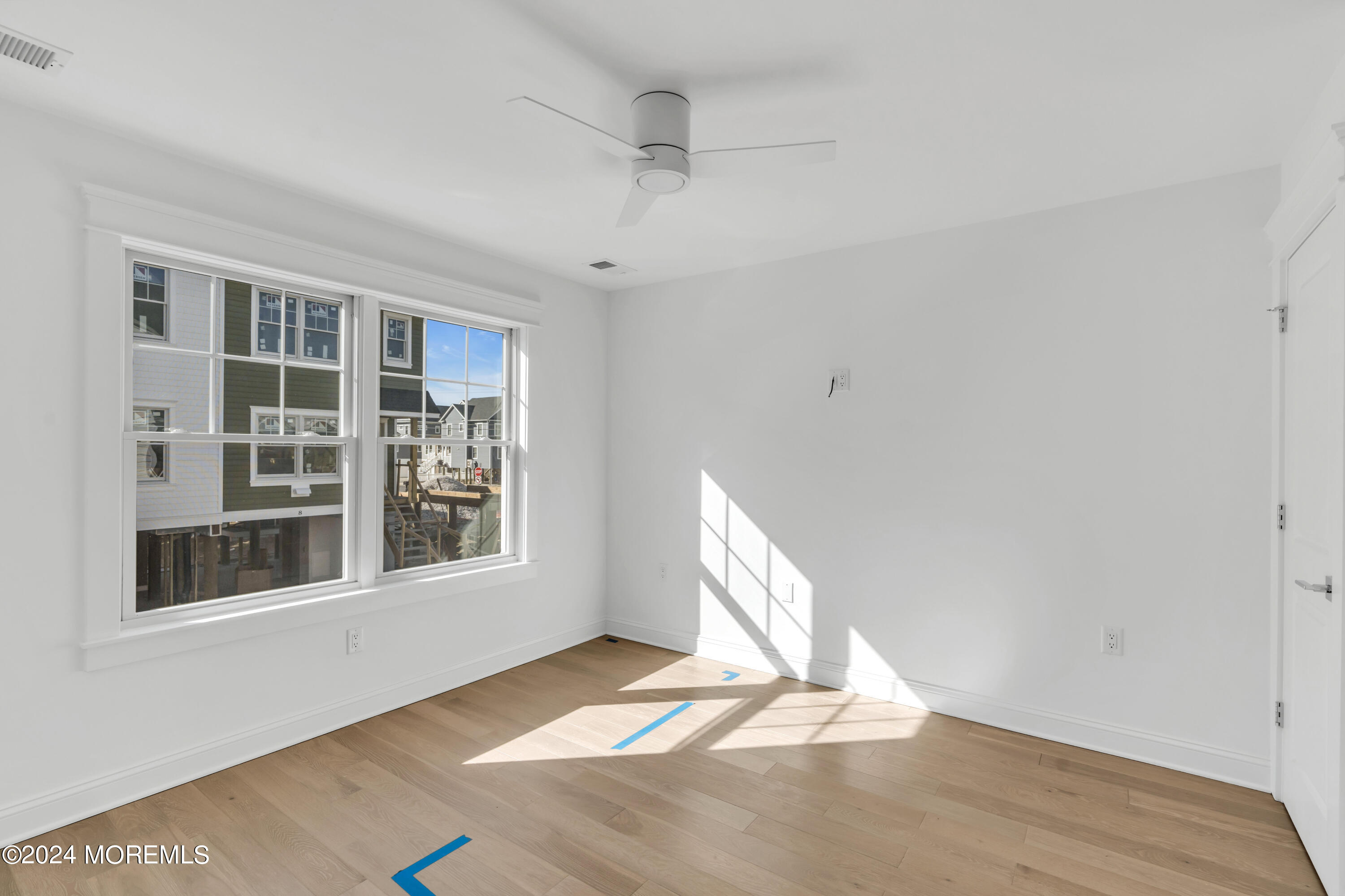 17 Shell Road, Unit 138 Mantoloking, NJ 08738 - Photo 9 of 45 a view of an empty room with a window