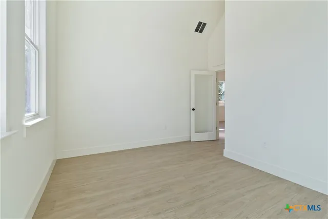 an empty room with a window