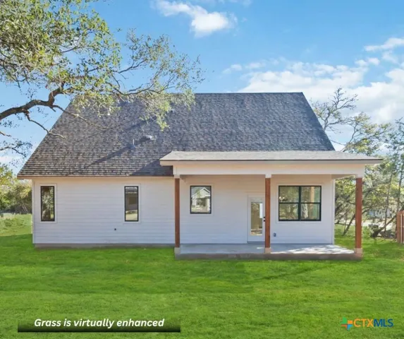 a view of front house with yard