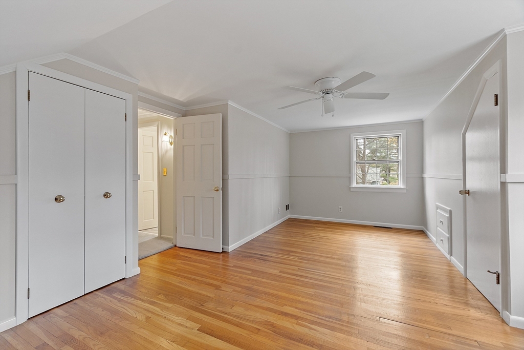 14 Ocean Street Manchester, MA 01944 - Photo 13 of 25 a view of an empty room with a window and a kitchen