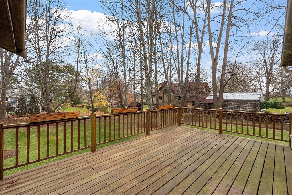 14 Ocean Street Manchester, MA 01944 - Photo 21 of 25 a view of balcony with wooden floor and fence
