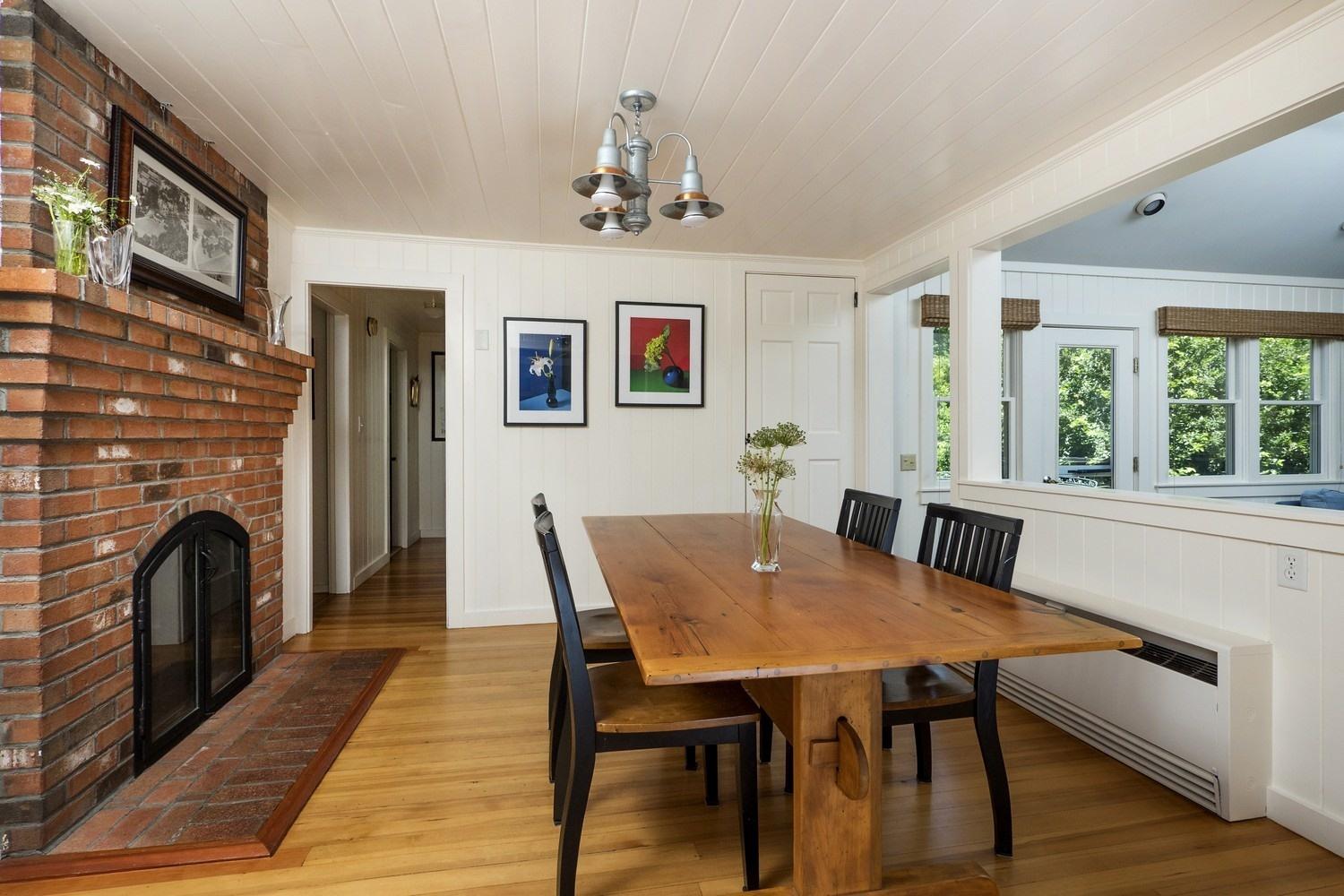 45 Gibson Road Orleans, MA 02653 - Photo 13 of 28 a view of a dining room with furniture window and wooden floor