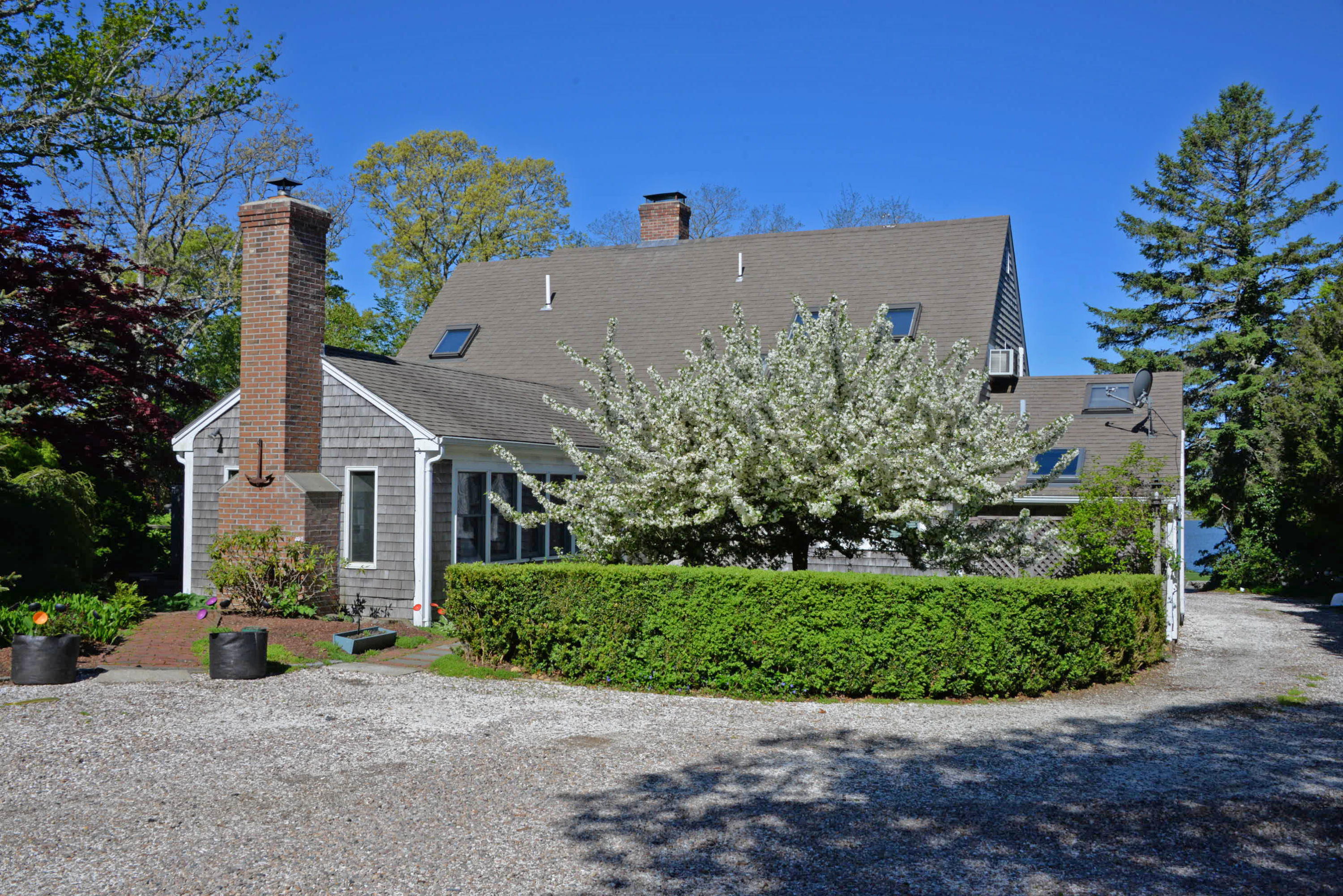 45 Gibson Road Orleans, MA 02653 - Photo 25 of 28 front view of a house with a yard