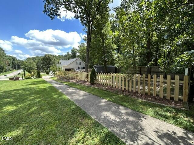 6813 Barbee Road Durham, NC 27713 - Photo 53 of 72 Sideyard Sidewalk Fence