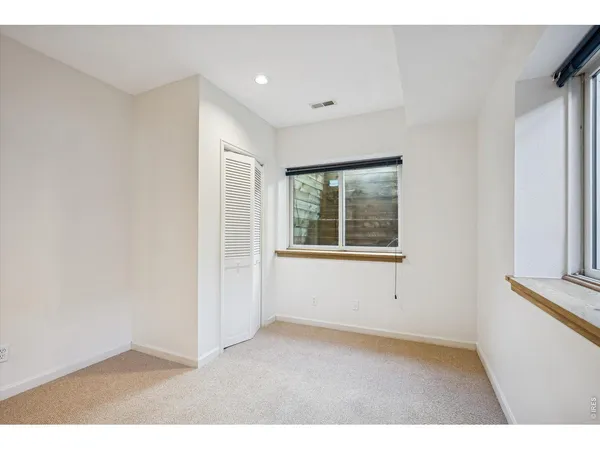 an empty room with closet