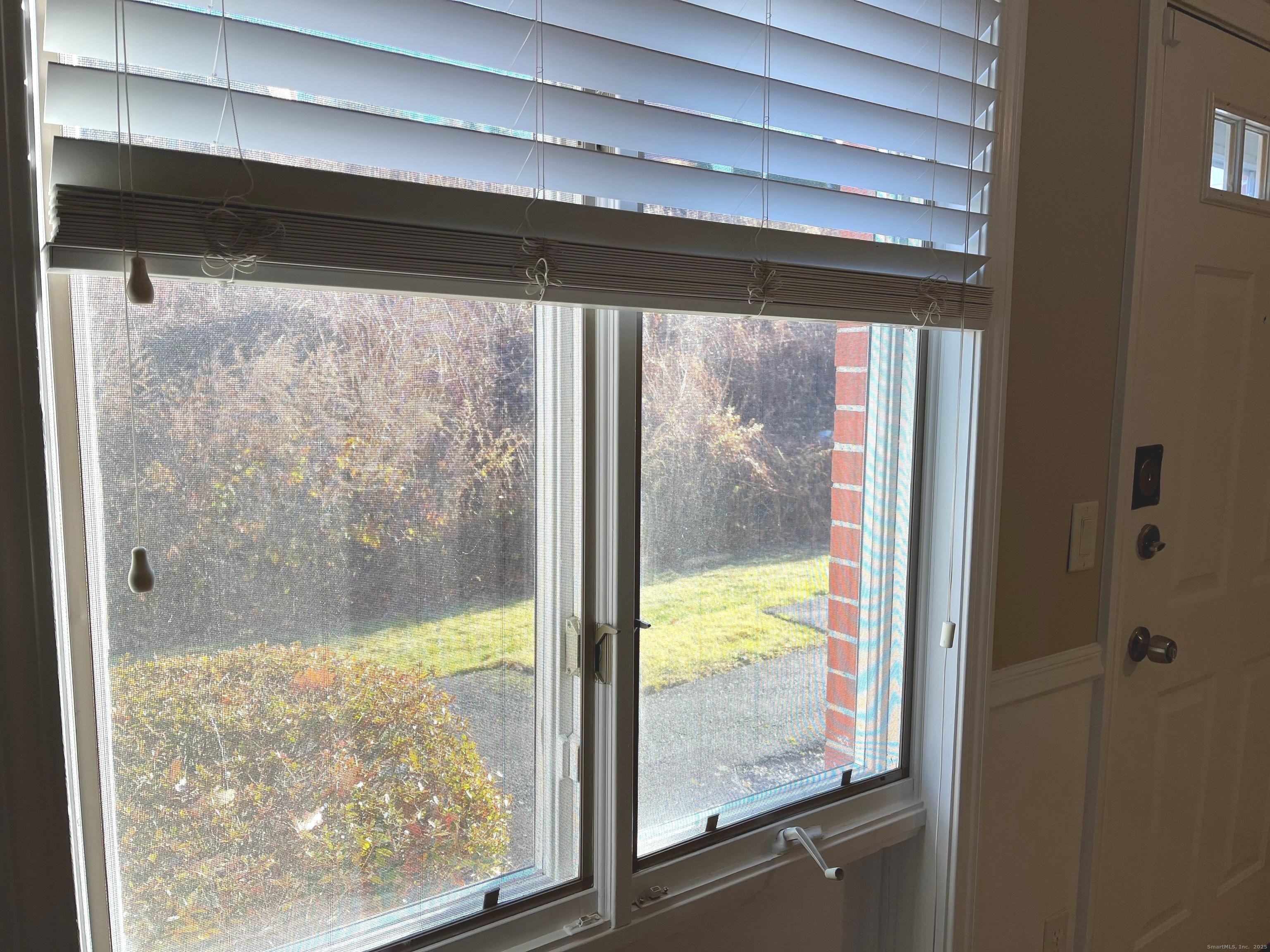 585 Park Road, Unit 112 Waterbury, CT 06708 - Photo 13 of 14 a view of a glass door with a large window