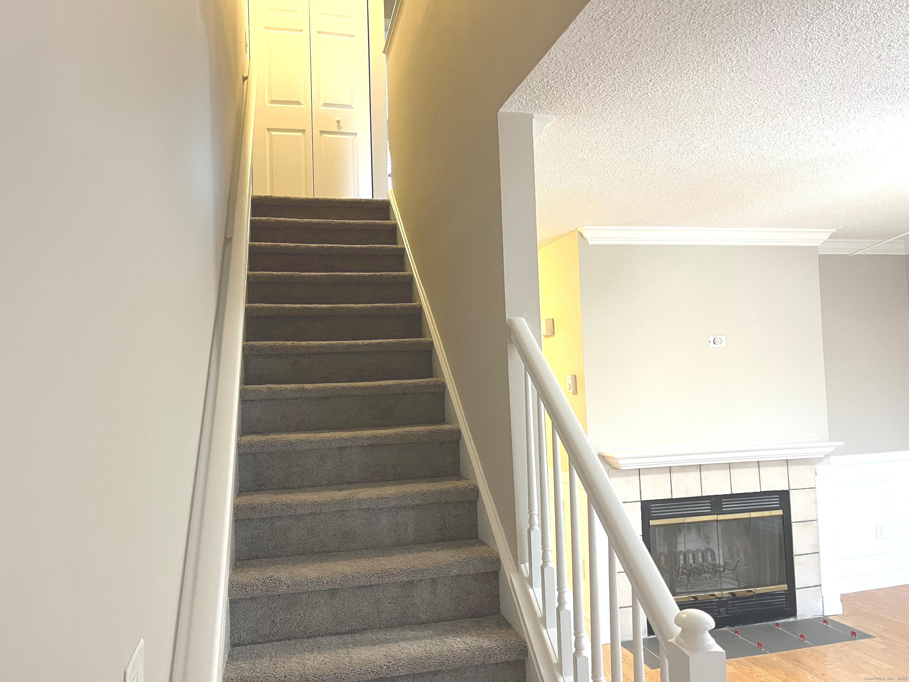 585 Park Road, Unit 112 Waterbury, CT 06708 - Photo 6 of 14 a view of entryway and hall with wooden floor