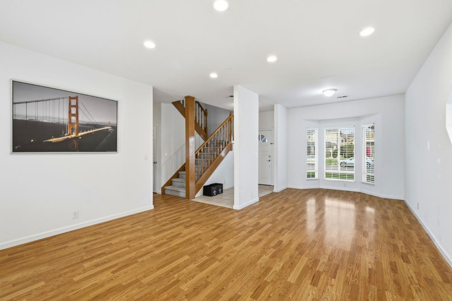 1672 Bailey Drive Ripon, CA 95366 - Photo 13 of 49 a view of a livingroom with wooden floor and stairs