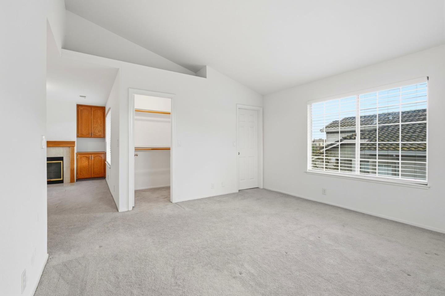 1672 Bailey Drive Ripon, CA 95366 - Photo 23 of 49 an empty room with a kitchen and a window