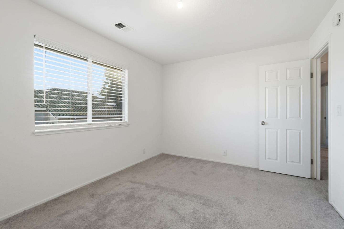 1672 Bailey Drive Ripon, CA 95366 - Photo 30 of 49 a view of an empty room with a window