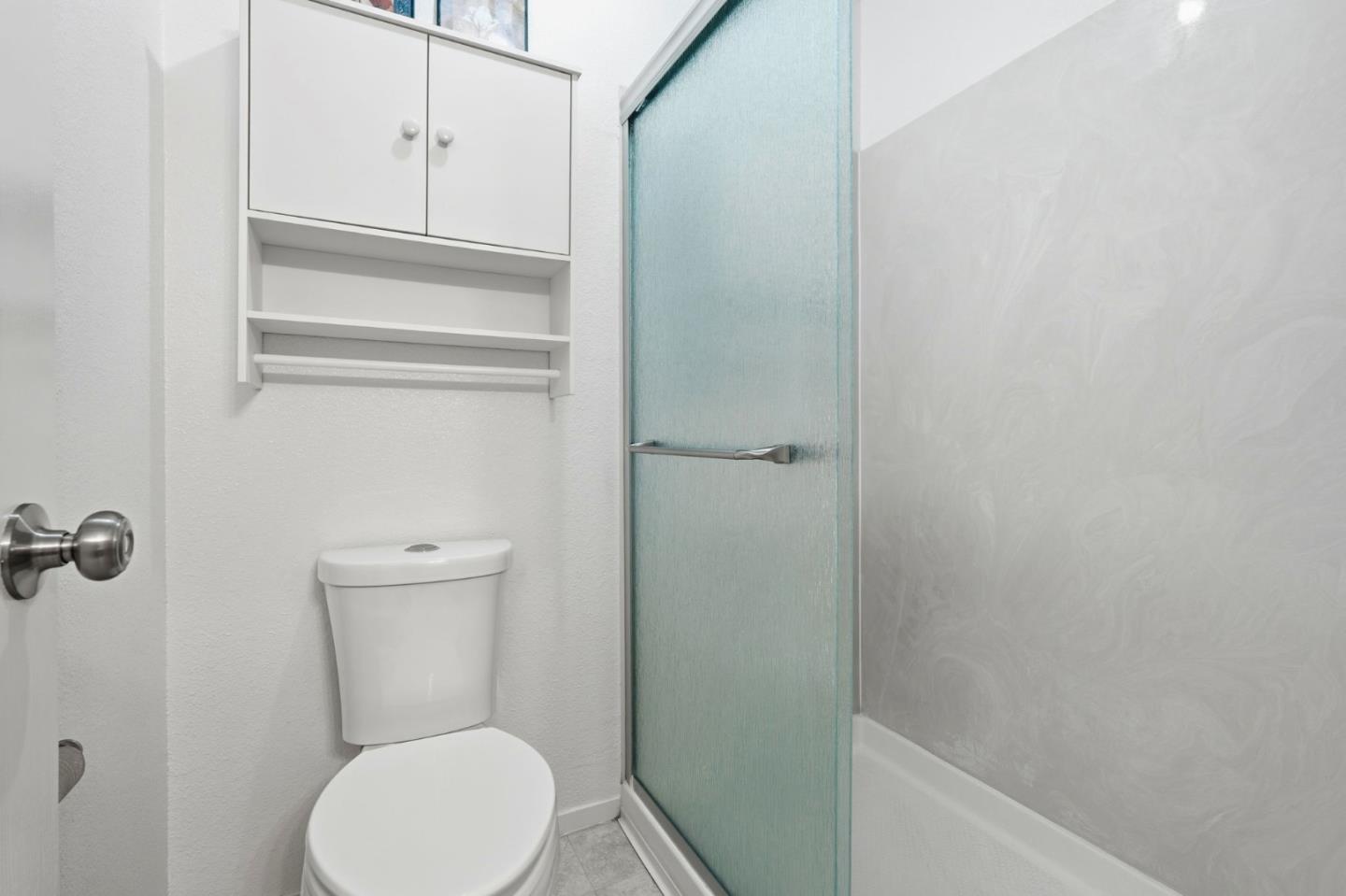 1672 Bailey Drive Ripon, CA 95366 - Photo 41 of 49 a white toilet sitting next to a sink