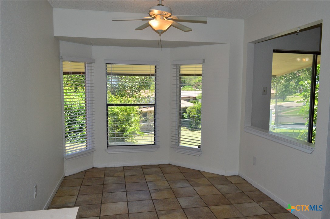 1404 Rob Lane Copperas Cove, TX 76522 - Photo 17 of 31 wooden floor in an empty room with a window