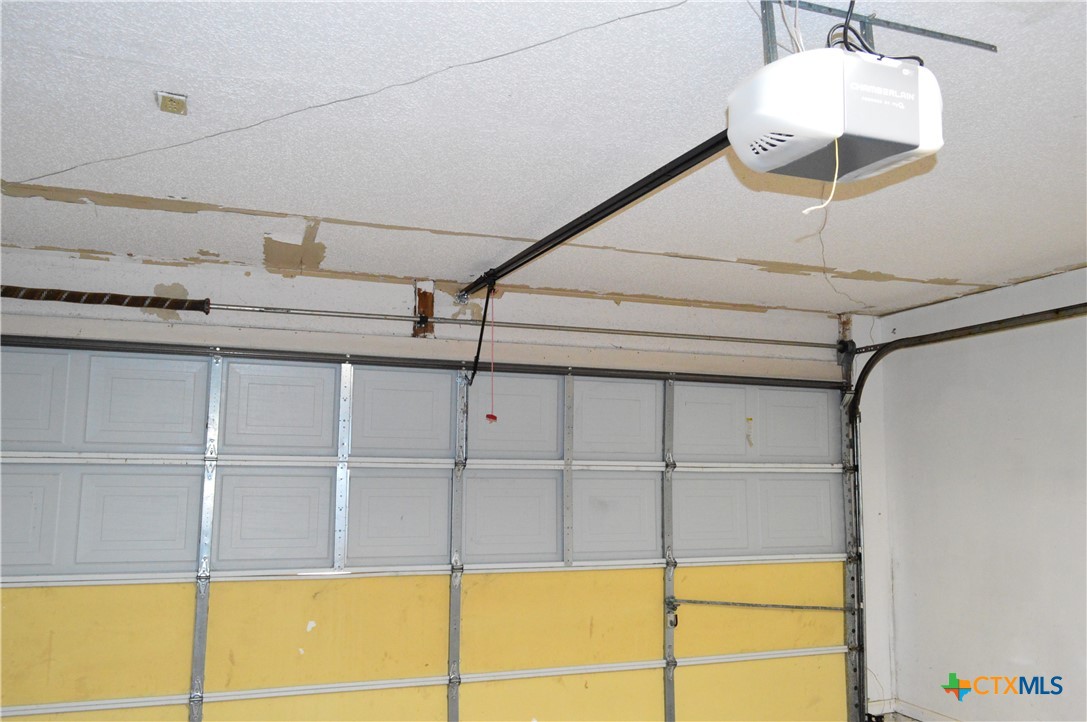 1404 Rob Lane Copperas Cove, TX 76522 - Photo 28 of 31 a view of a room with cabinet and a ceiling fan