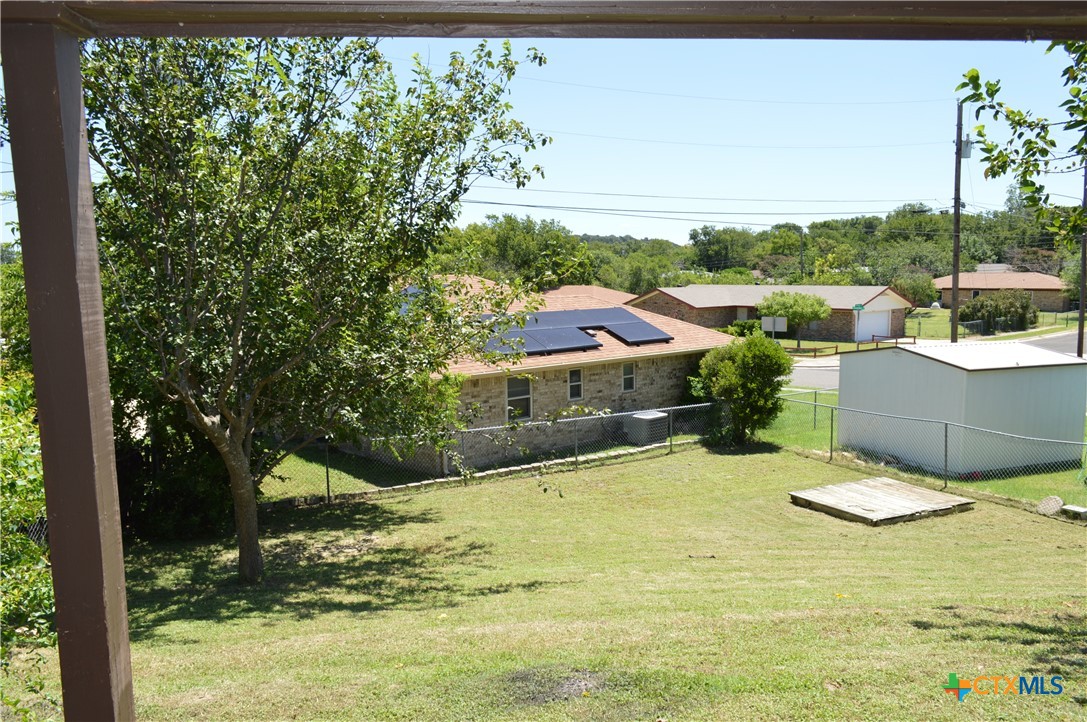 1404 Rob Lane Copperas Cove, TX 76522 - Photo 29 of 31 a view of a patio with couches plants and large trees