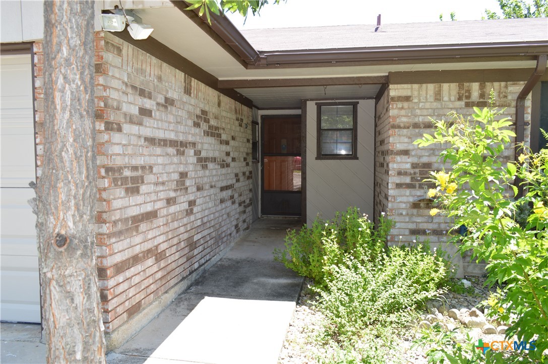 1404 Rob Lane Copperas Cove, TX 76522 - Photo 3 of 31 a front view of a house with a garage