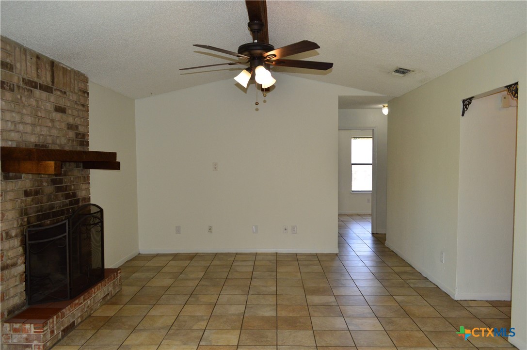 1404 Rob Lane Copperas Cove, TX 76522 - Photo 10 of 31 a view of a livingroom with a ceiling fan and window