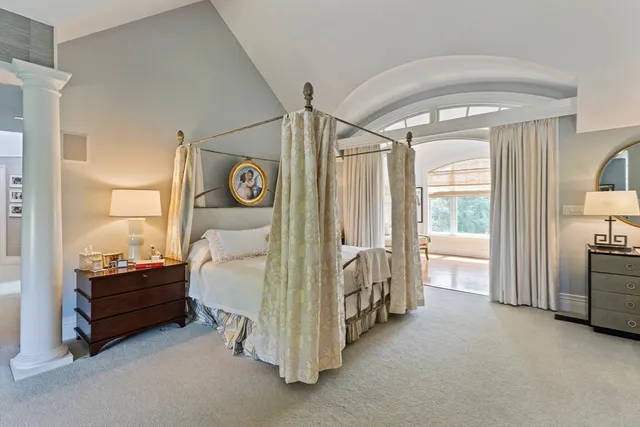 a bathroom with a tub toilet and sink