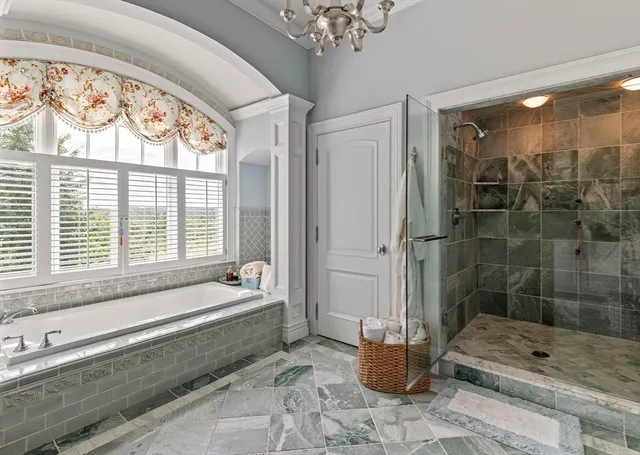 a kitchen with stove and cabinets