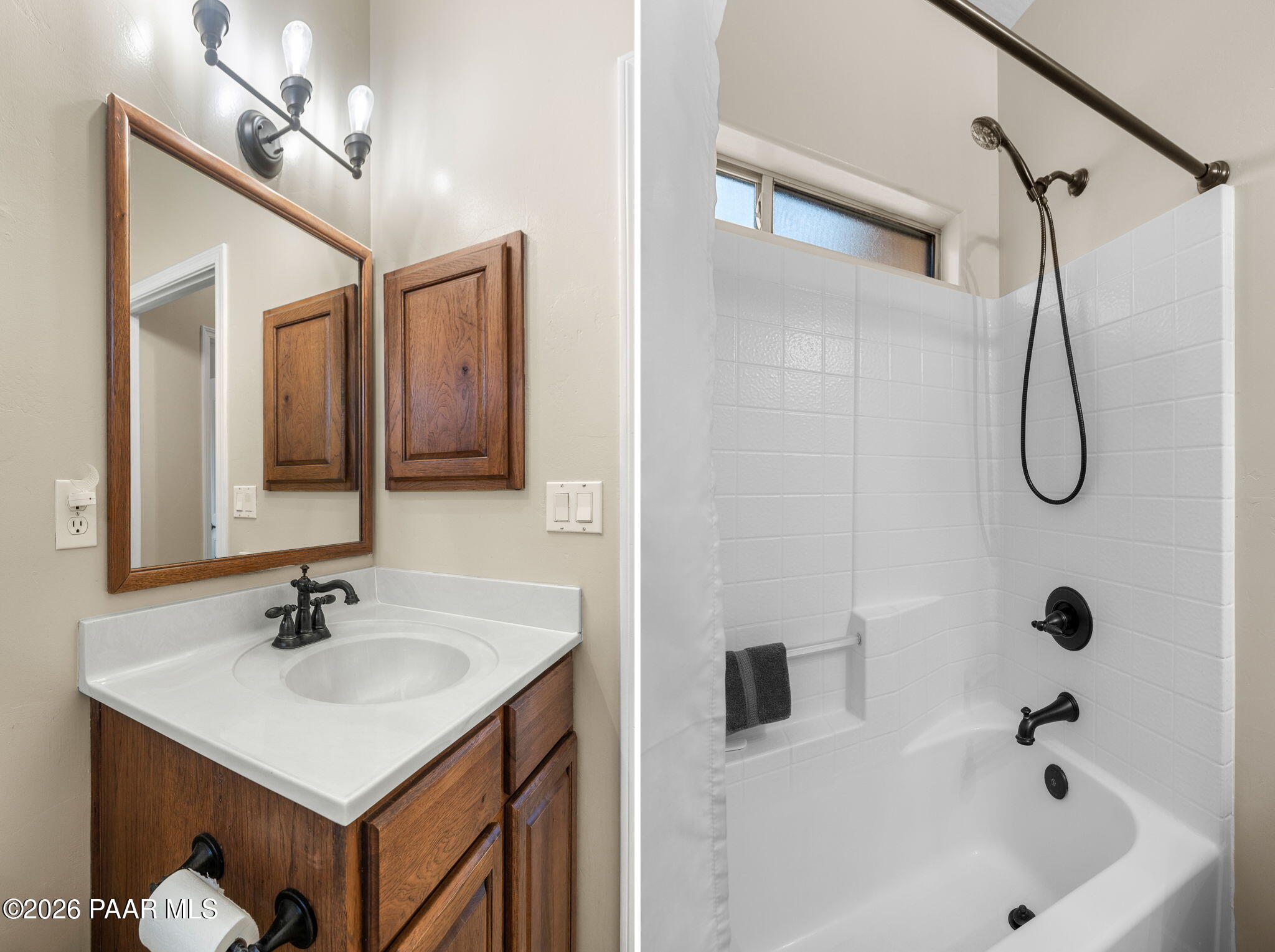 26455 North Bull Snake Road Paulden, AZ 86334 - Photo 13 of 40 a bathroom with a sink a shower and a mirror
