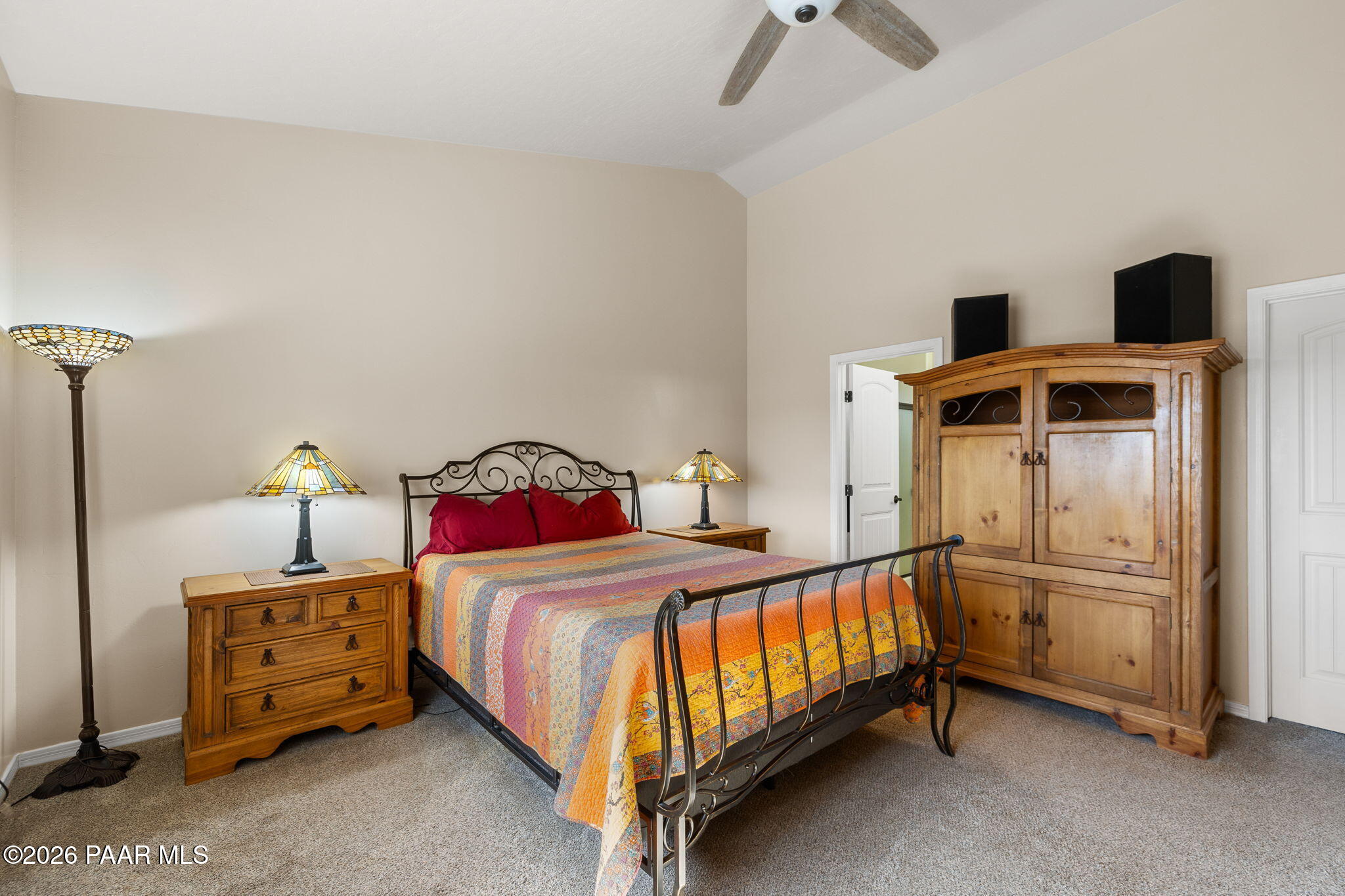 26455 North Bull Snake Road Paulden, AZ 86334 - Photo 15 of 40 a bedroom with a bed and a tv on the dresser