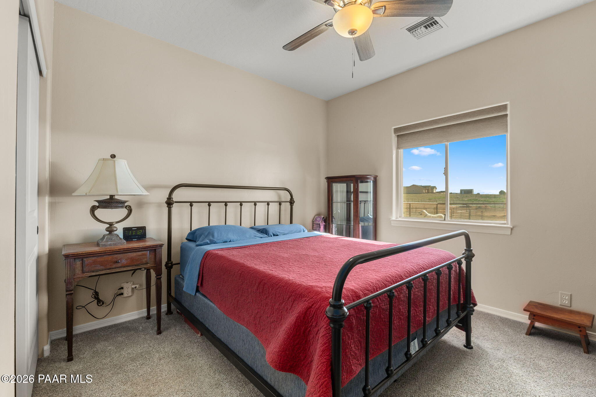 26455 North Bull Snake Road Paulden, AZ 86334 - Photo 18 of 40 a bedroom with a bed and a window