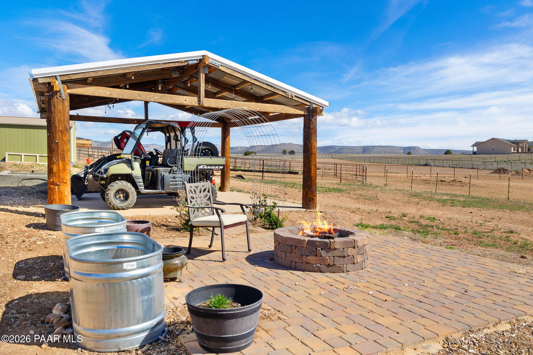 26455 North Bull Snake Road Paulden, AZ 86334 - Photo 25 of 40 a view of a patio with chairs and potted plants