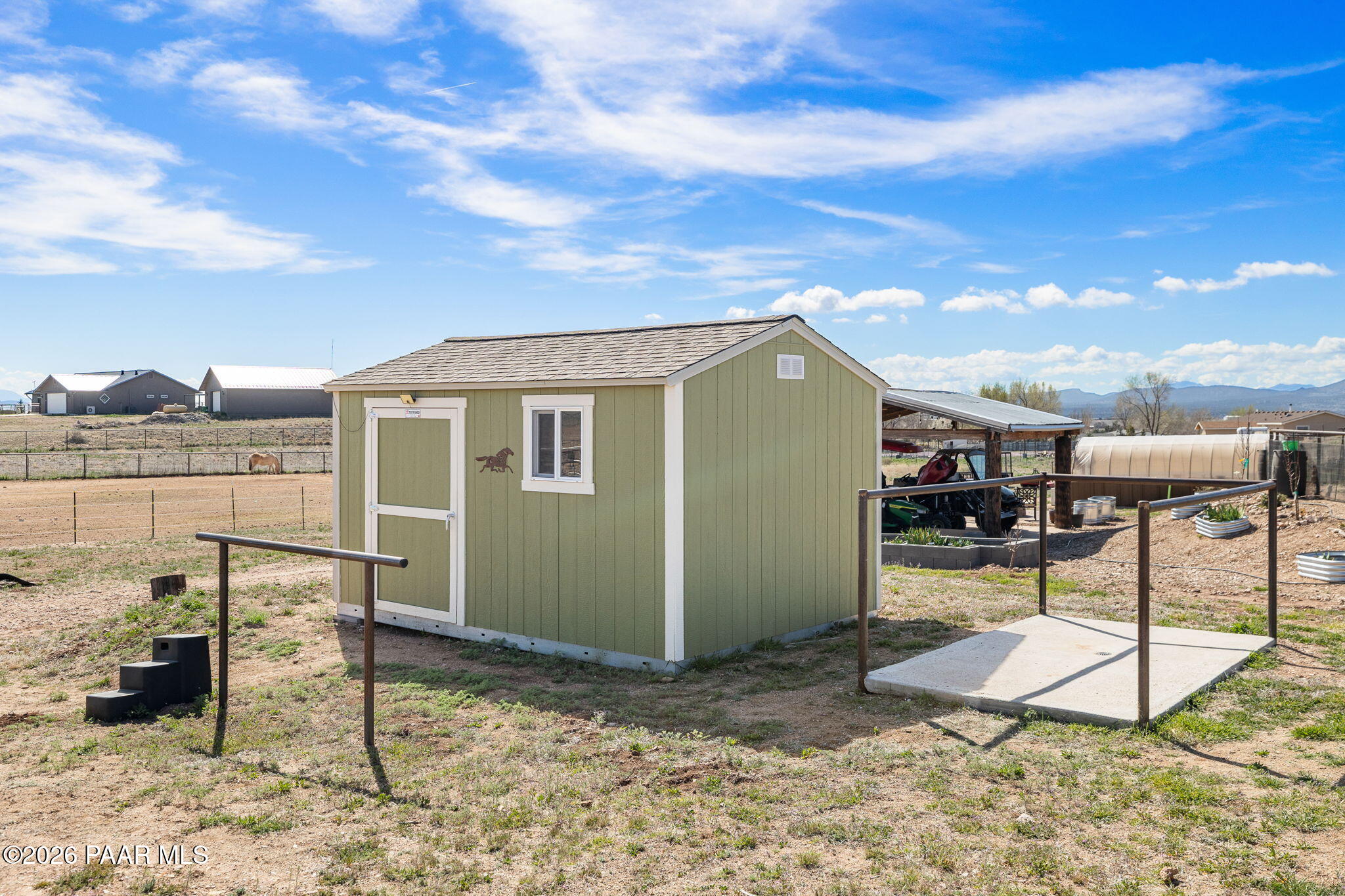 26455 North Bull Snake Road Paulden, AZ 86334 - Photo 28 of 40 a view of a terrace with a bench