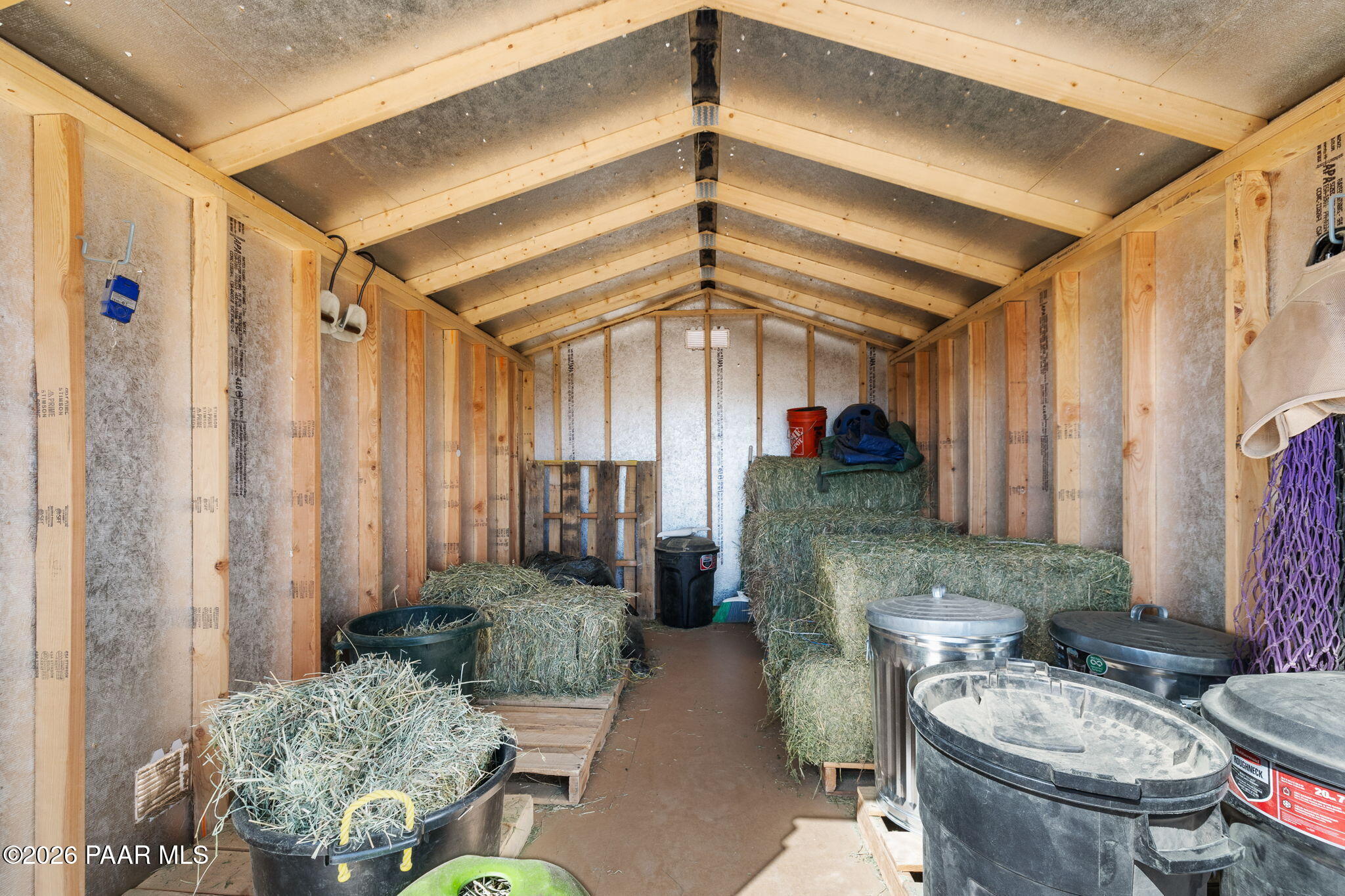 26455 North Bull Snake Road Paulden, AZ 86334 - Photo 30 of 40 a bathroom with a sink a toilet a mirror and shower curtain